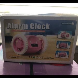 Rolling alarm clock